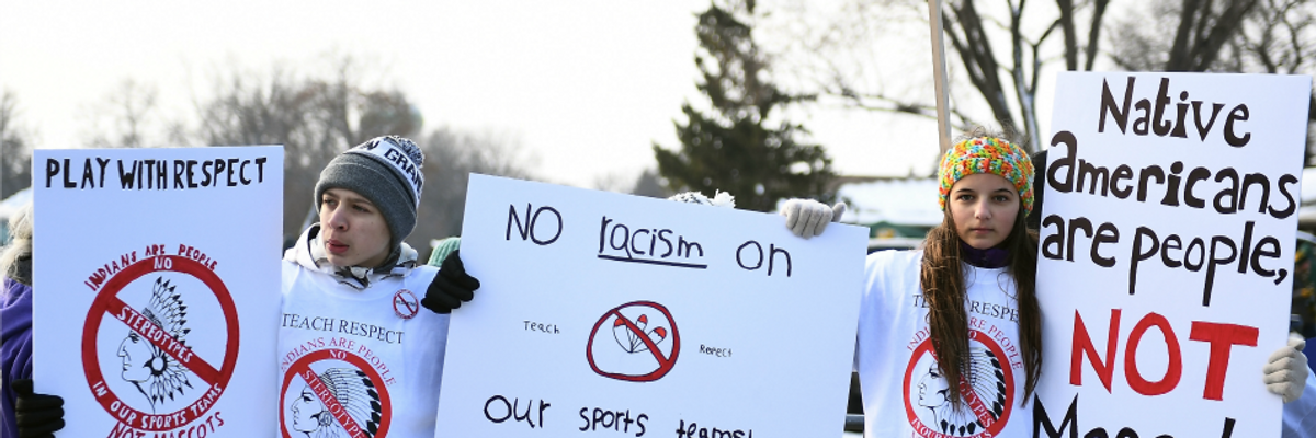 Protestors rally outside of Lambeau Field prior to the game between the Green Bay Packers and the Washington Redskins on December 8, 2019 in Green Bay, Wisconsin