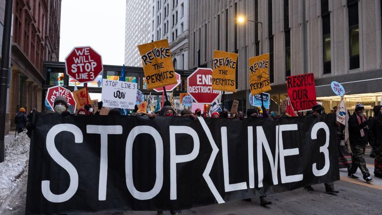 Protests march through downtown St. Paul, MN with a Stop Line 3 banner on January 29, 2021. (Photo: Tim Evans/NurPhoto via Getty Images)