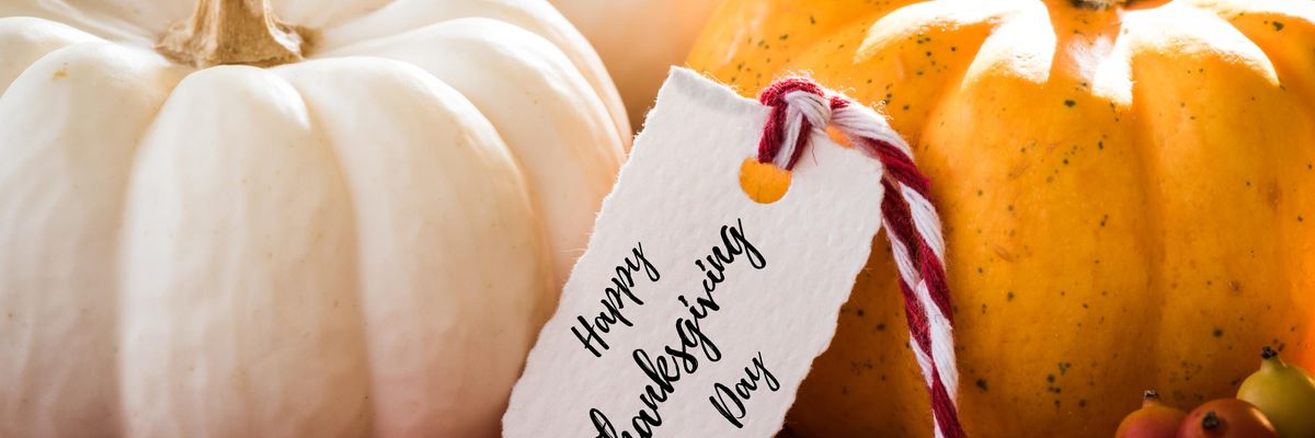 pumpkins with Happy Thanksgiving tag