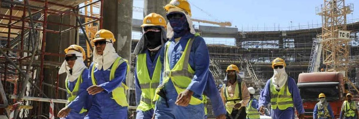 Fifa Official Demands Payment for Qatar Migrant Workers