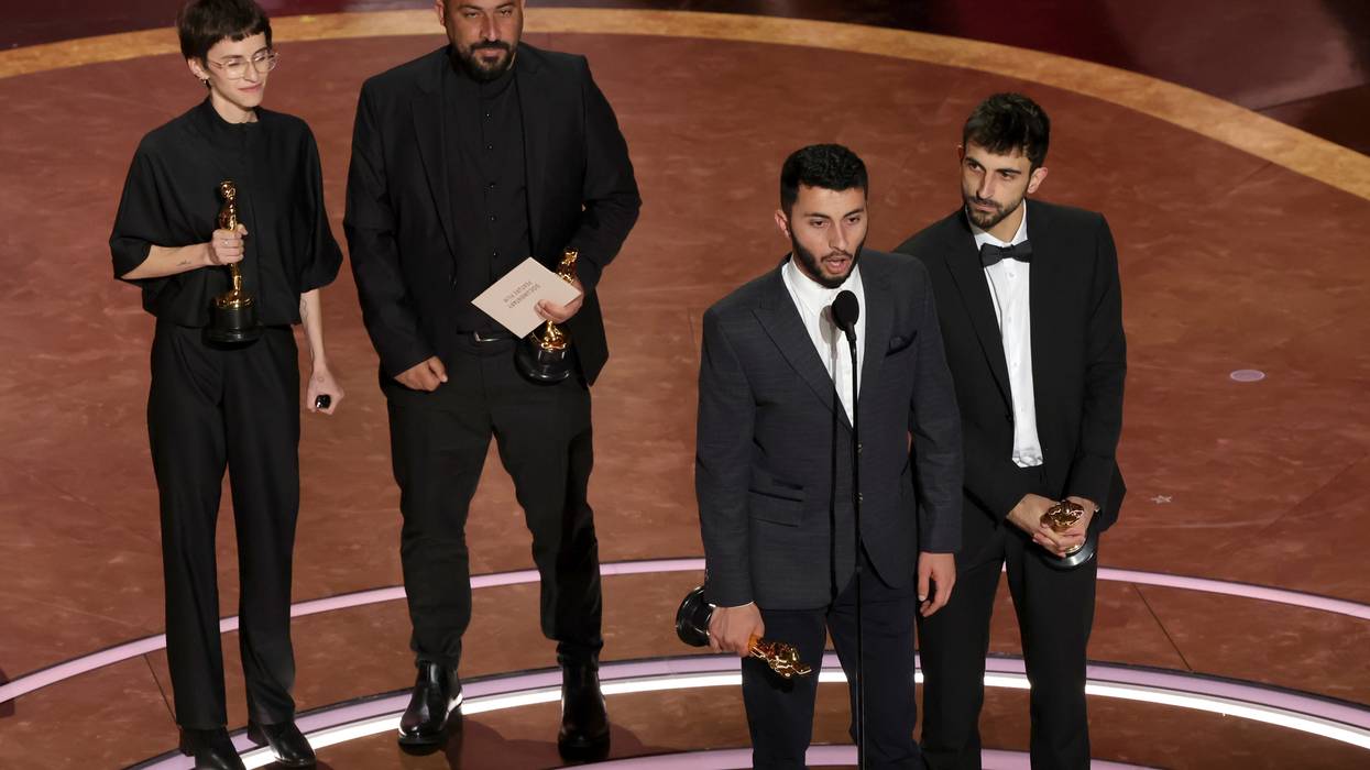 Rachel Szor, Hamdan Ballal, Basel Adra, and Yuval Abraham accept the Documentary Feature Film Academy Award