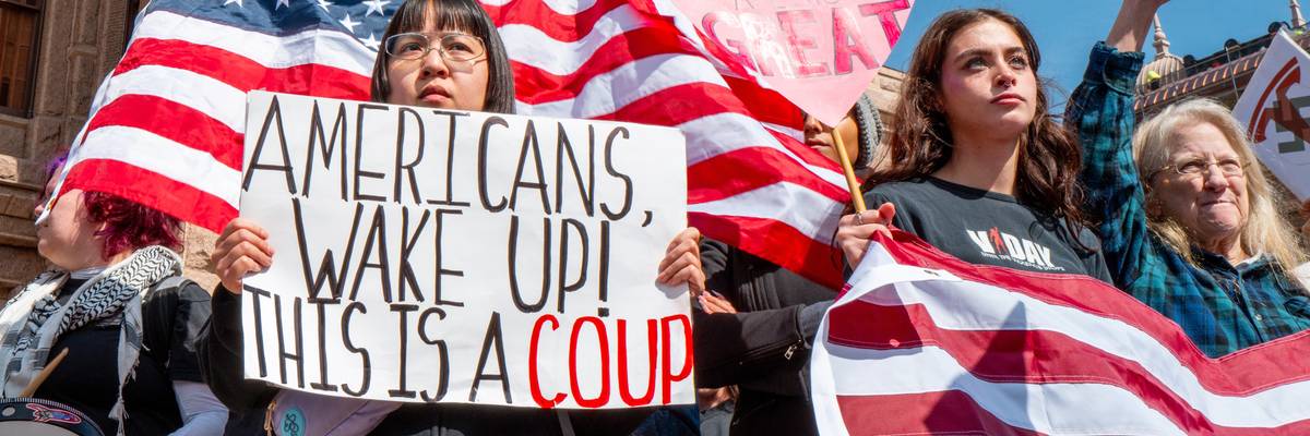 Rally goers protest against U.S. President Donald Trump