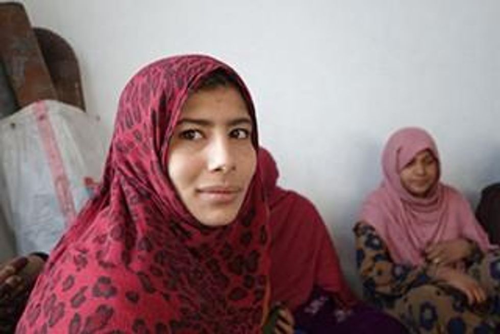 Ramzia, an IDP from Laghman province, works in the JRS kindergarten in