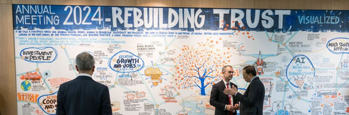 'Rebuilding Trust' sign at Davos in 2024