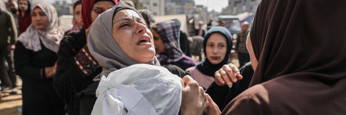 Relatives mourn the loss of loved ones killed in an Israeli attack as bodies including children are brought to Indonesian Hospital before burial in Jabalia, Gaza