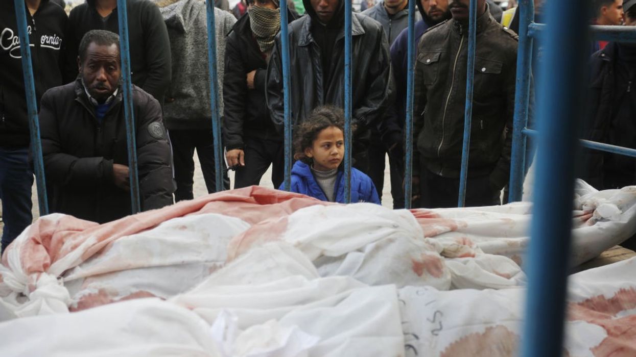 Relatives of Palestinians killed in the Israeli war on Gaza mourn