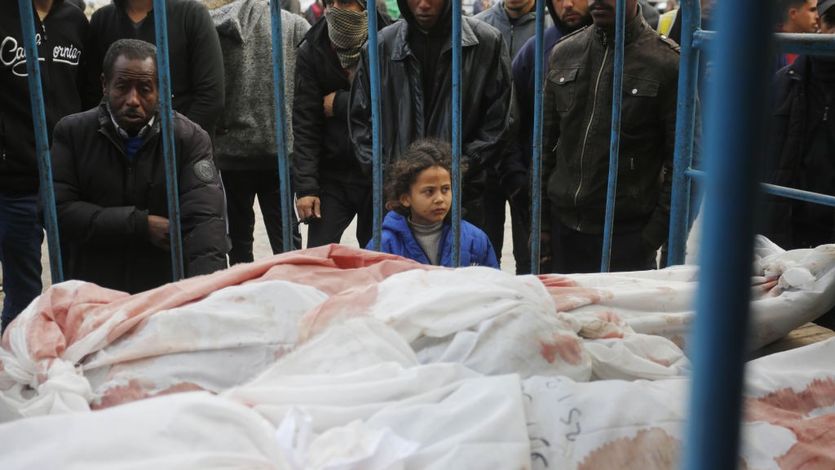 Relatives of Palestinians killed in the Israeli war on Gaza mourn