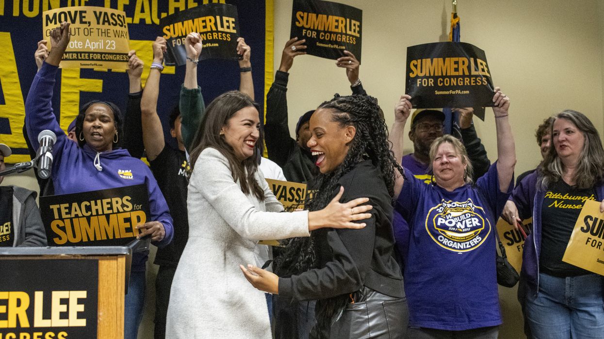 Rep. Alexandria Ocasio-Cortez (D-N.Y.) embraces Rep. Summer Lee (D-Penn.)