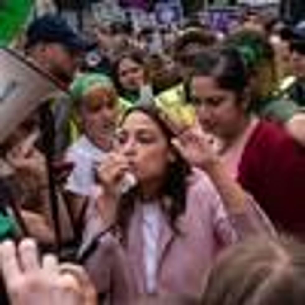 Rep. Alexandria Ocasio-Cortez speaks at a rally