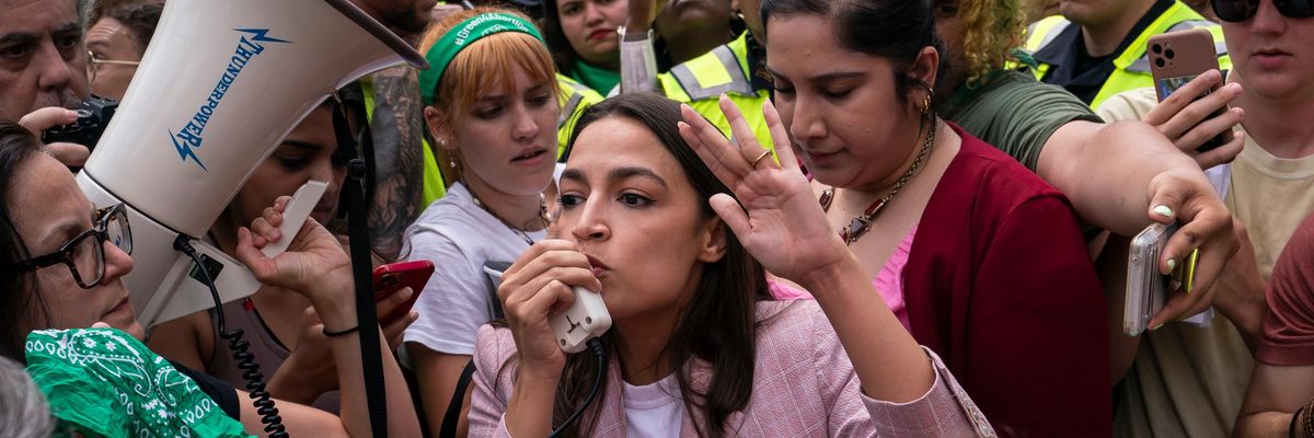Rep. Alexandria Ocasio-Cortez speaks at a rally