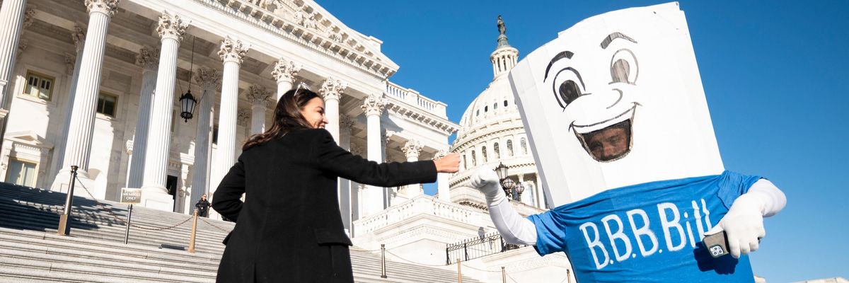 Rep. Alexandria Ocasio-Cortez walks up the House steps.