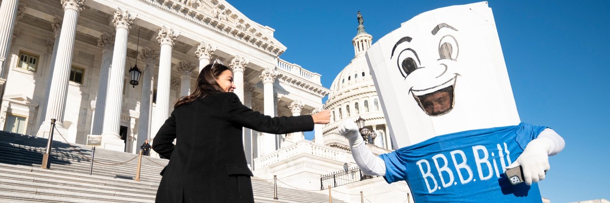 Rep. Alexandria Ocasio-Cortez walks up the House steps.