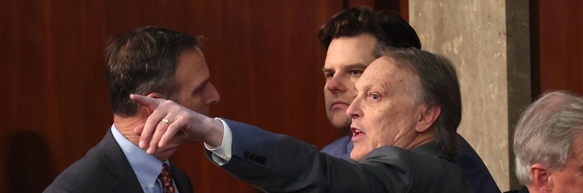 Rep. Andy Biggs talks with Reps. Matt Gaetz and Scott Perry