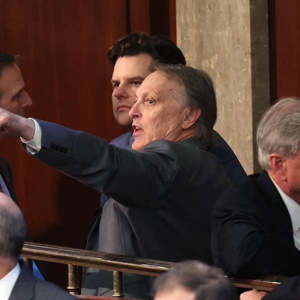 Rep. Andy Biggs talks with Reps. Matt Gaetz and Scott Perry
