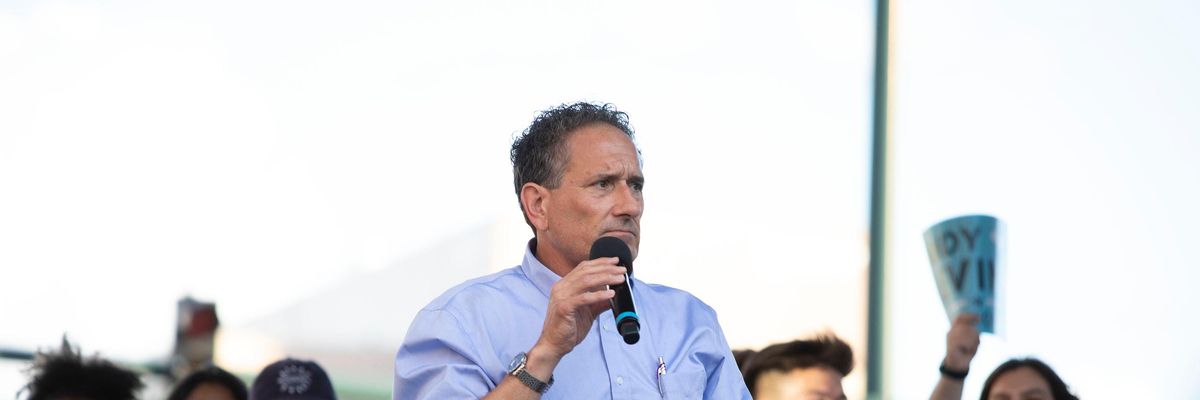 Rep. Andy Levin speaks at a rally
