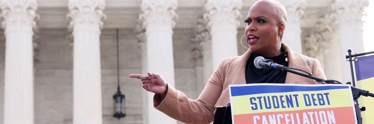 Rep. Ayanna Pressley speaks at a rally with student loan borrowers