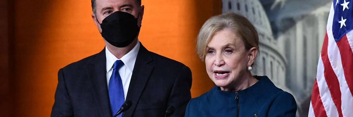 Rep. Carolyn Maloney (D-N.Y.) speaks and Rep. Adam Schiff (D-Calif.) listens during a press conference in Washington, D.C. on December 9, 2021.