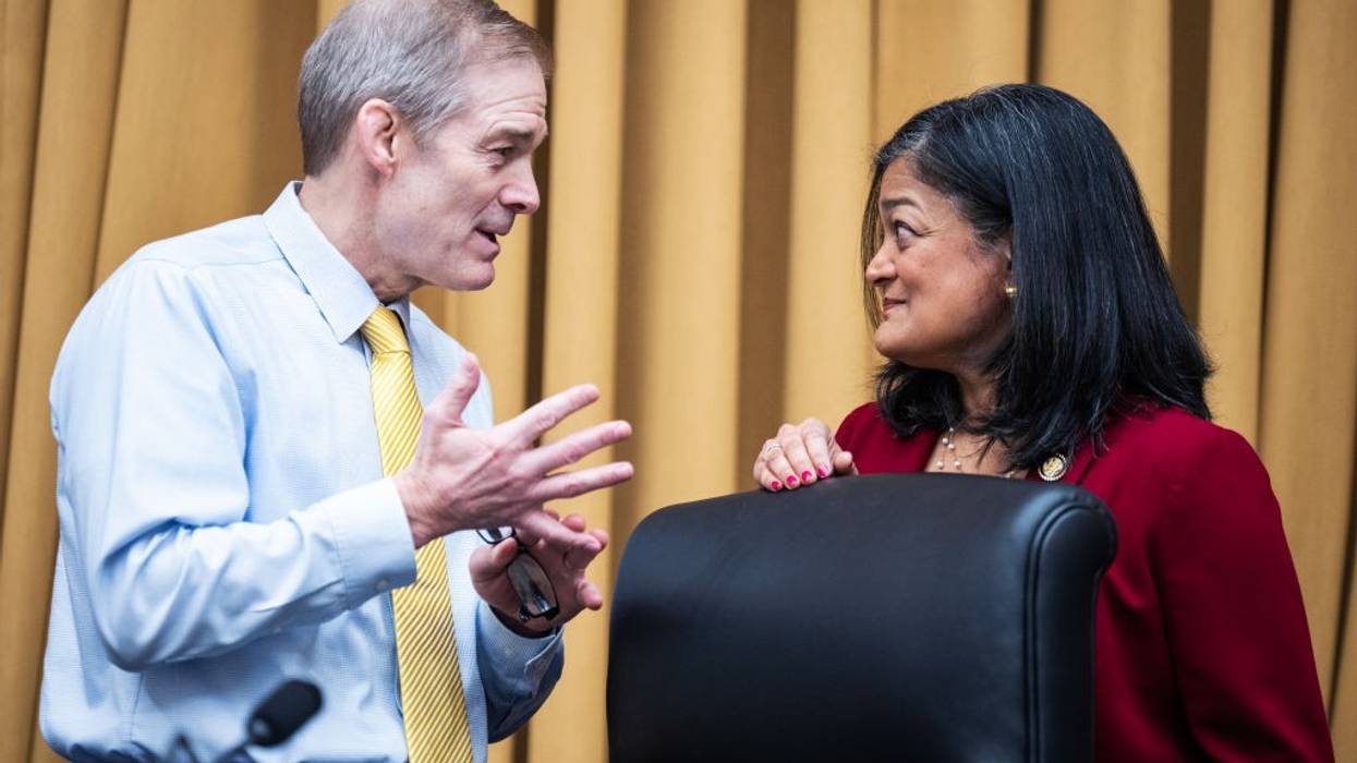 Rep. Jim Jordan (R-Ohio) talks with Rep. Pramila Jayapal (D-Wash.)
