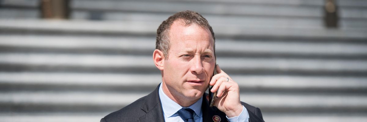 Rep. Josh Gottheimer talks on the phone