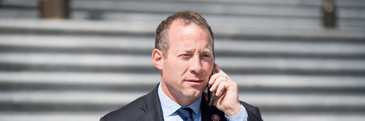 Rep. Josh Gottheimer talks on the phone