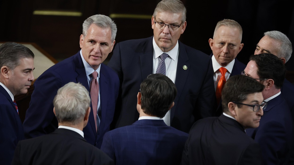 Rep. Kevin McCarthy talks with fellow Republican members of the House