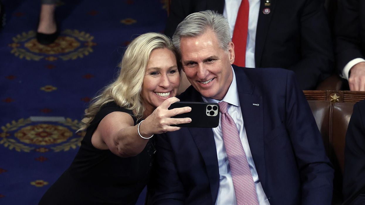 Rep. Marjorie Taylor Greene (R-Ga.) takes a photo with U.S. House Republican Leader Kevin McCarthy