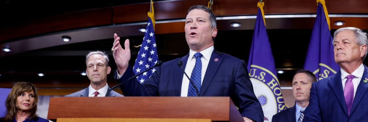 Rep. Ronny Jackson (R-Texas) speaks from a podium.