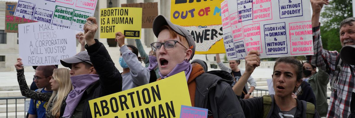 Reproductive rights advocates protest in response to the leaked Supreme Court draft decision to overturn Roe v. Wade on May 3, 2022 in Washington, D.C.