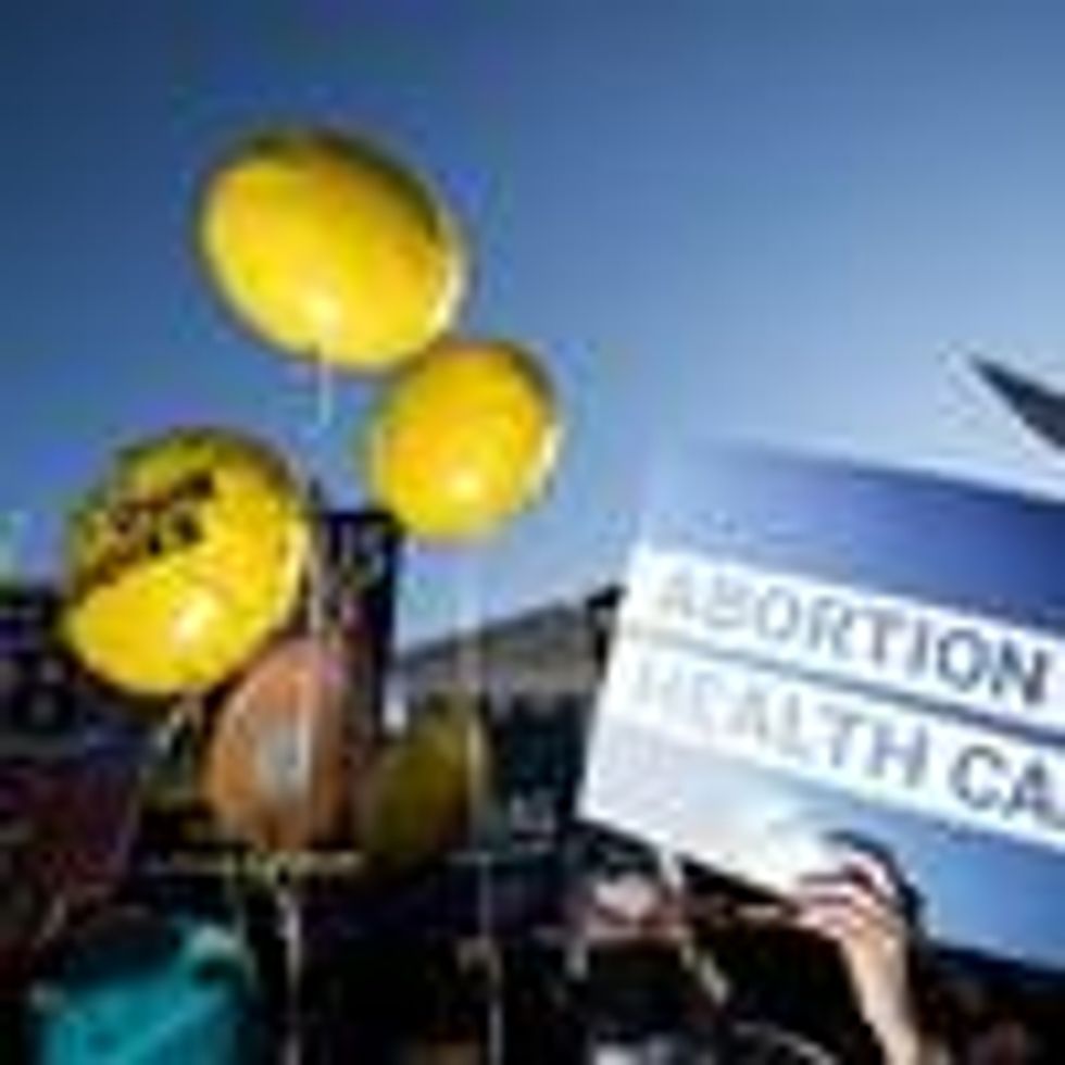 Reproductive rights and anti-choice protesters rally outside the U.S. Supreme Court before the start of oral arguments in Dobbs v. Jackson Women's Health Organization case on December 1, 2021