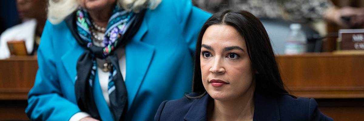 Reps. Alexandria Ocasio-Cortez (D-N.Y.) and Debbie Dingell (D-Mich.)