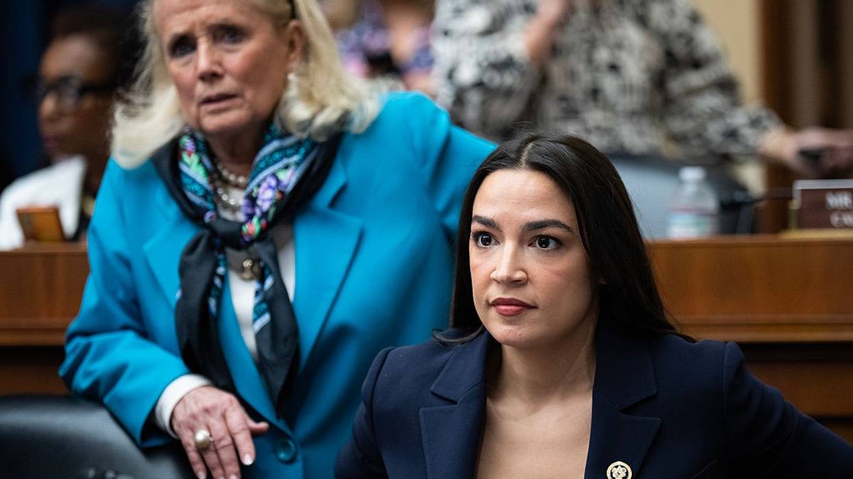 Reps. Alexandria Ocasio-Cortez (D-N.Y.) and Debbie Dingell (D-Mich.)