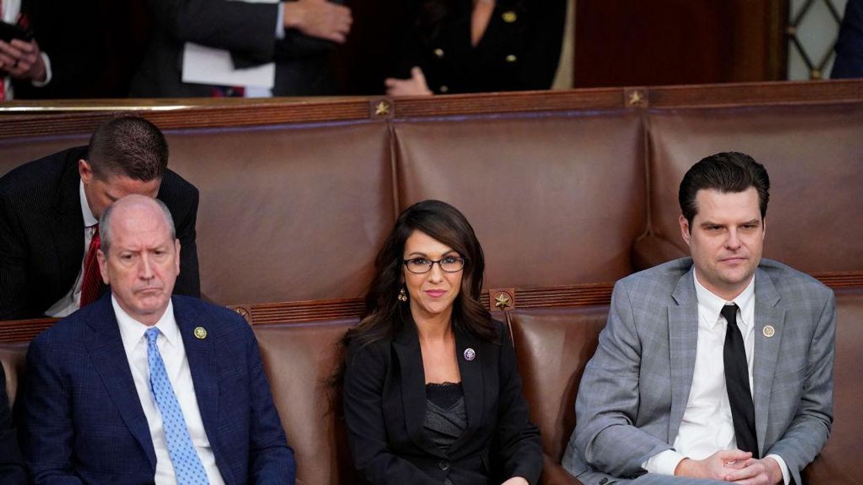 Reps. Dan Bishop (R-N.C.), Lauren Boebert (R-Colo.), and Matt Gaetz (R-Fla.) watch floor