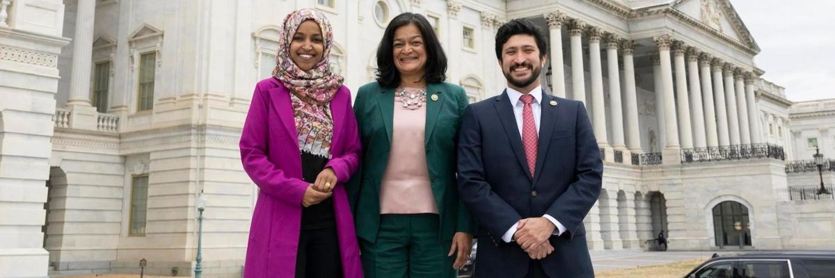 Reps. Ilhan Omar, Pramila Jayapal, and Greg Casar smile and pose for a photo outside the U.S. Capitol