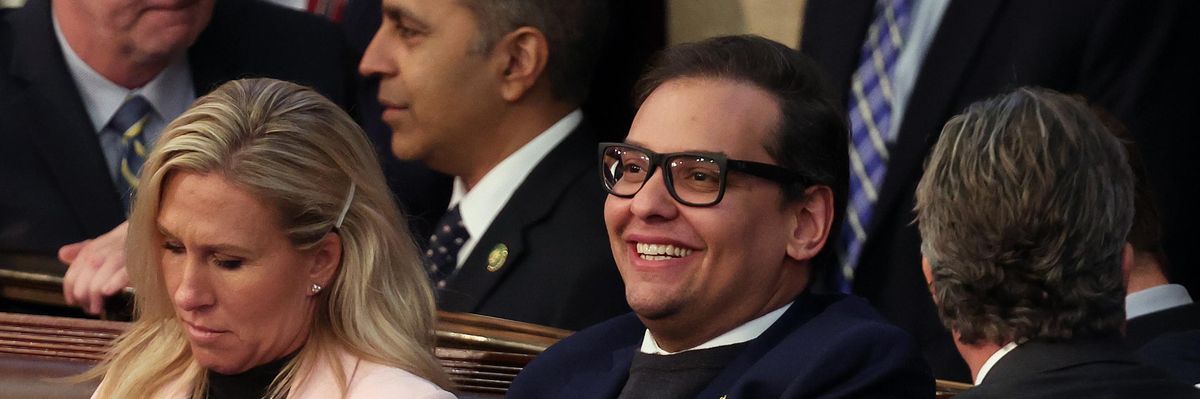 Reps. Marjorie Taylor Greene and George Santos sit in the House chamber