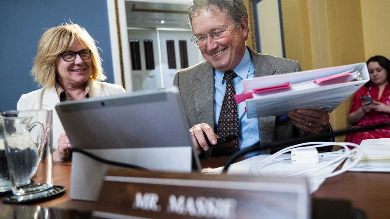 Reps. Thomas Massie and Michelle Fischbach attend a House meeting