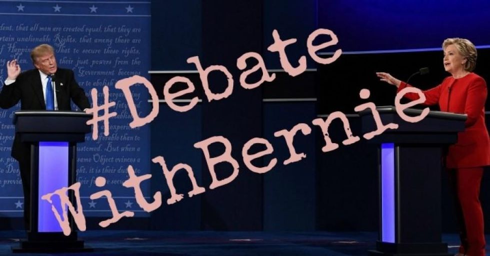 Republican nominee Donald Trump speaks as Democratic nominee Hillary Clinton gestures during the first presidential debate at Hofstra University in Hempstead, New York on Monday. (Photo: AFP/Getty Images -- with overlay)