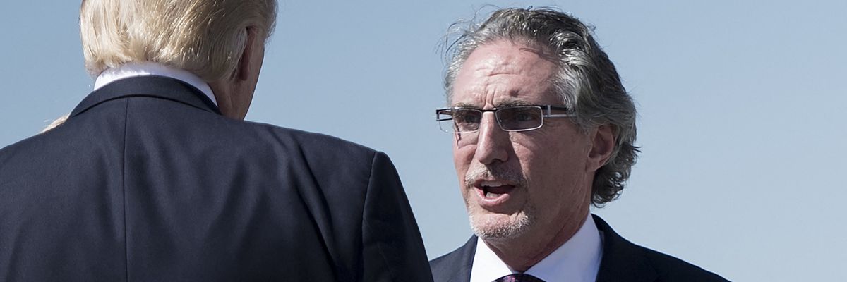 ​Republican North Dakota Gov. Doug Burgum greets then-U.S. President Donald Trump at Bismarck Municipal Airport on September 6, 2017.