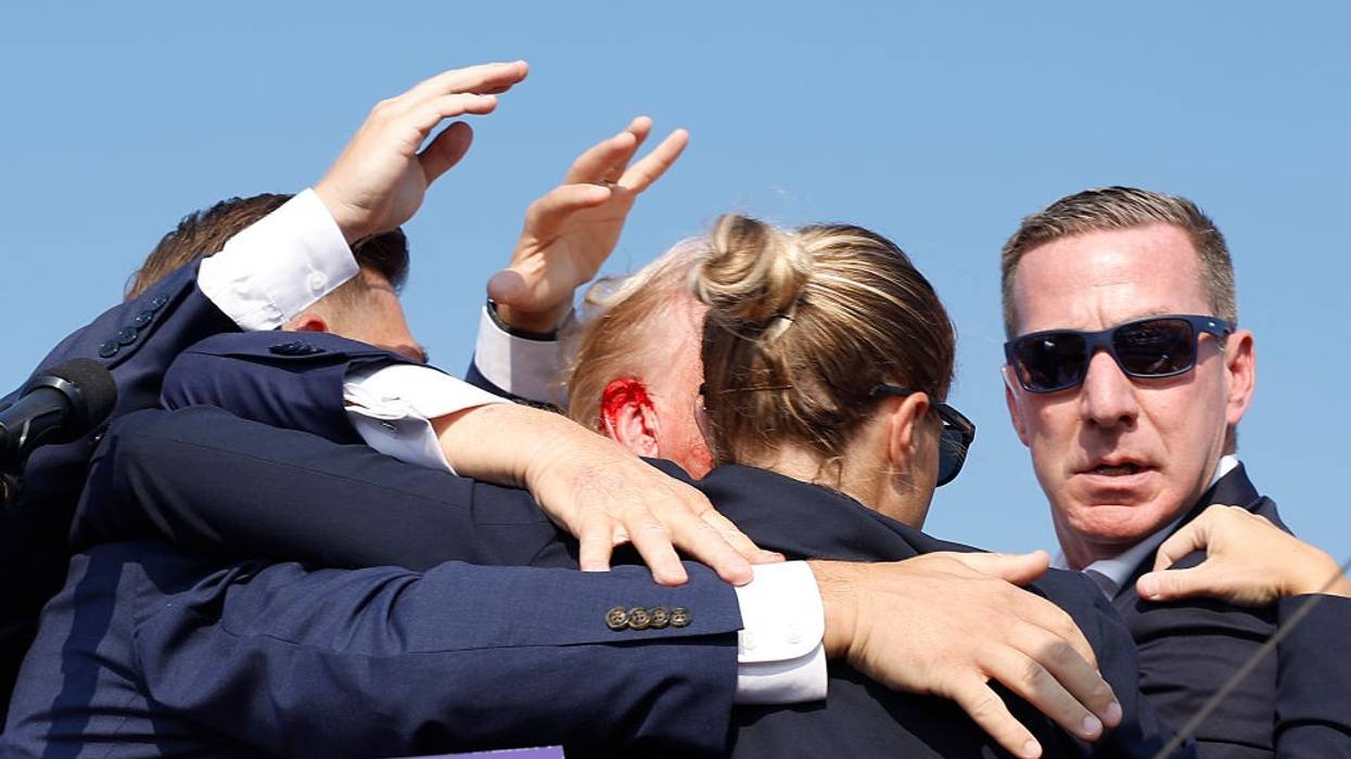 Trump Bloodied But 'Fine' After Assassination Attempt