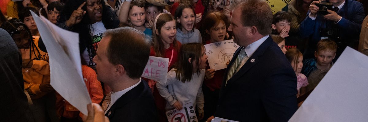 Republican Tennessee Rep. William Lamberth enters the House chamber as protesters demand gun safety laws on April 3, 2023 in Nashville.