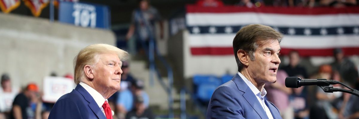 Republican U.S. Senate nominee Mehmet Oz speaks as former President Donald Trump listens during a campaign rally on September 3, 2022 in Wilkes-Barre, Pennsylvania.