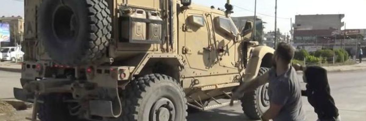 'Go Home America. After You Made Our Sons Die': Outraged Syrian Kurds Throw Dirt and Rotten Food at Fleeing US Troops