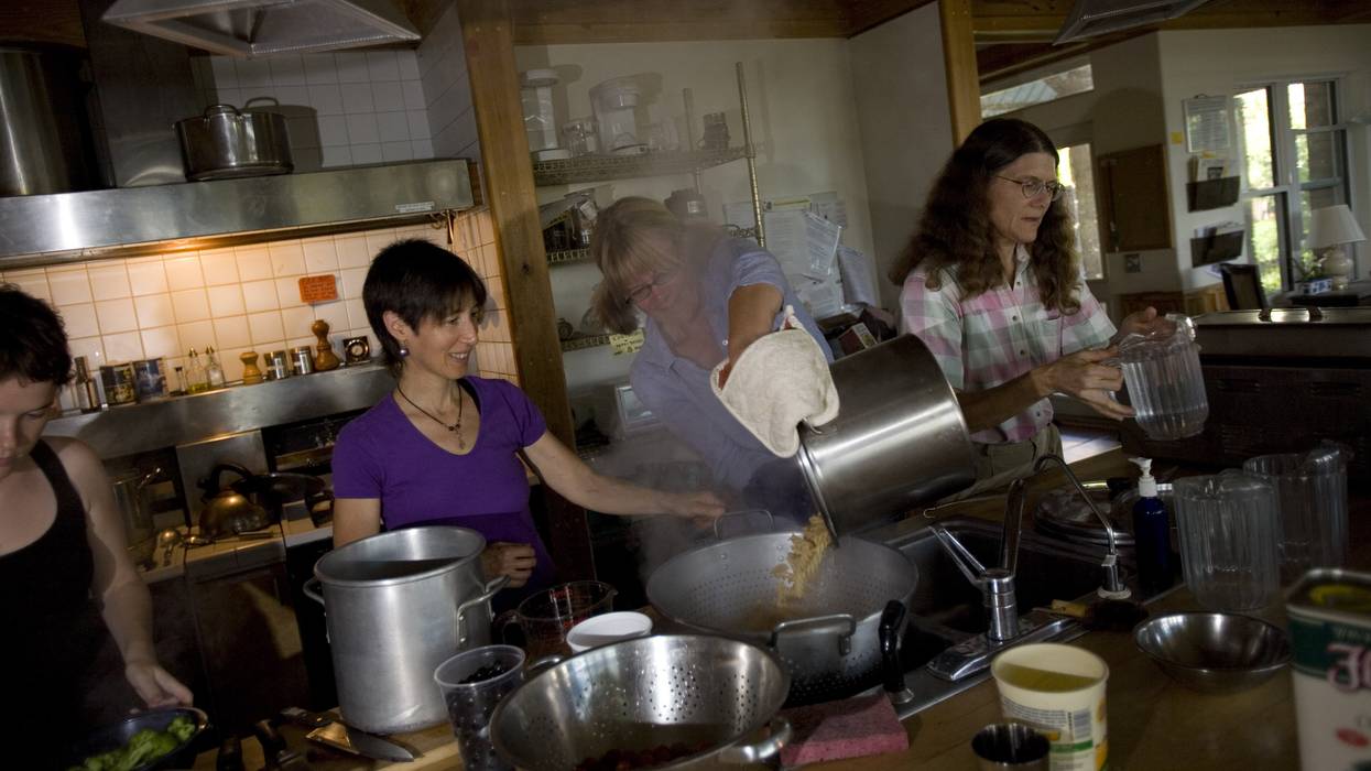 Residents cooking in an intentional community.