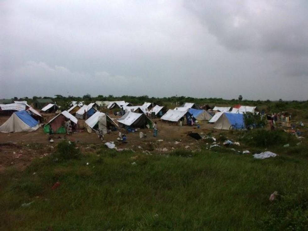Residents of this emergency relocation centre in the Panichchankerni village of the eastern Batticaloa District also bore the brunt of Sri Lanka's civil war, which finally ended in May 2009. (Photo: Amantha Perera/IPS)
