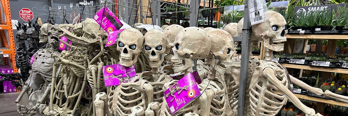 Retail display of plastic Halloween decorations, Skeletons in Home Depot, Queens, New York