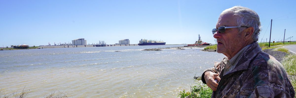 Retiree John Allaire stands in front of the Venture Global Calcasieu Pass liquefied natural gas export terminal in Cameron, Louisiana