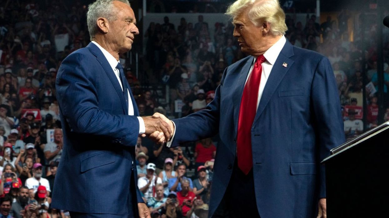 RFK Jr. and Donald Trump shake hands