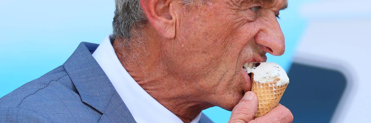 RFK Jr. eats an ice cream cone.