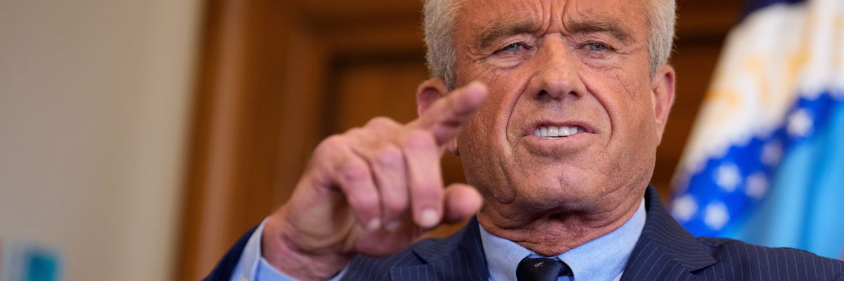 RFK Jr. points at the camera.