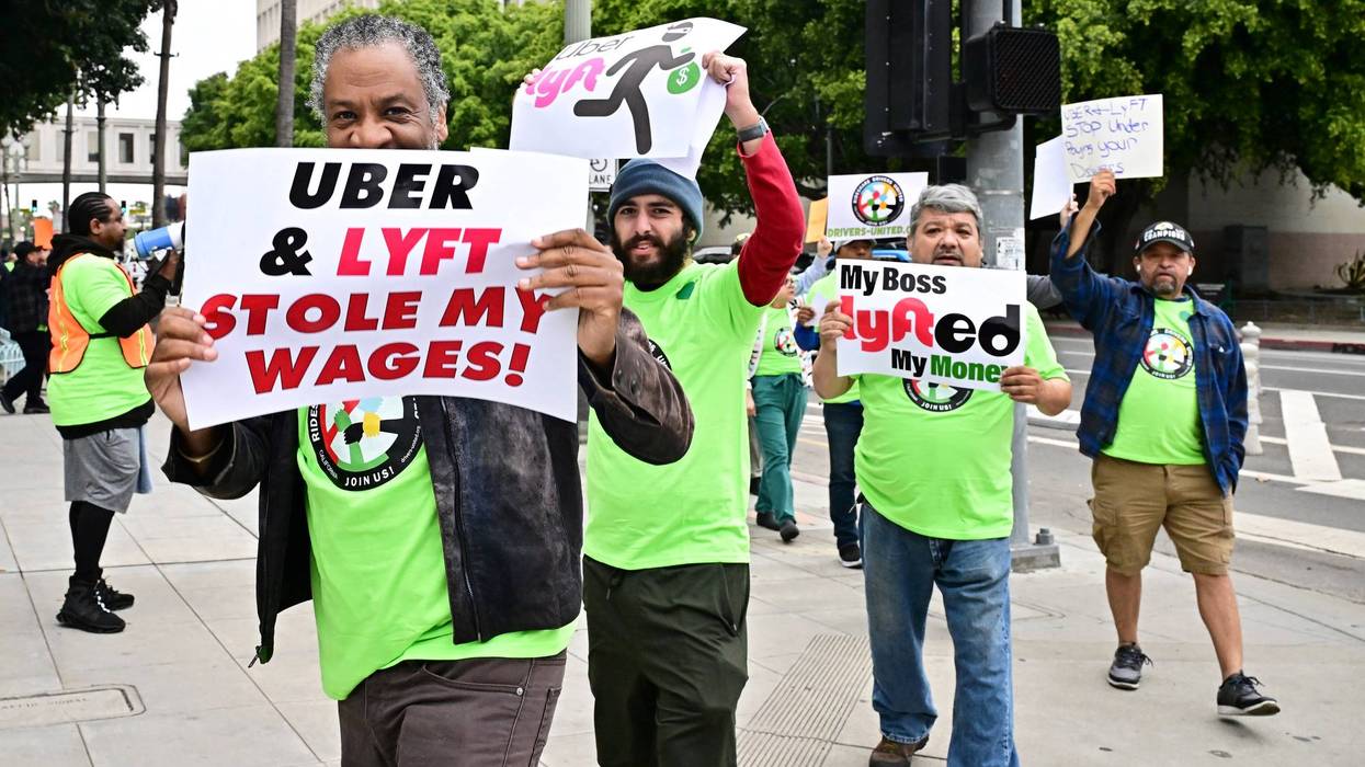 Ride-hail drivers rally outside Los Angeles City Hall