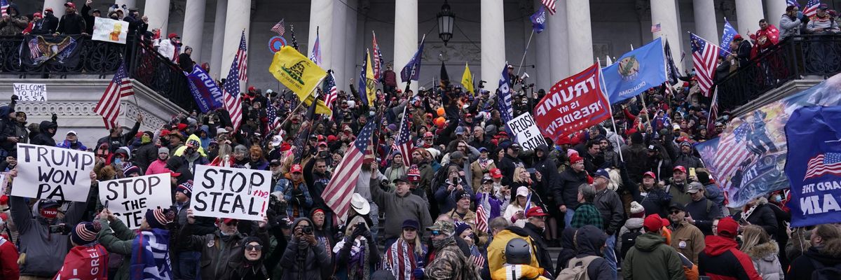 Right-wing insurrectionists, fueled by then-President Donald Trump's relentless lies about voter fraud, violently rioted at the U.S. Capitol in Washington, D.C., in an attempt to overturn the 2020 presidential election results before lawmakers finalized them in a joint session of the 117th Congress on January 6, 2021. (Photo: Kent Nishimura/Los Angeles Times via Getty Images)
